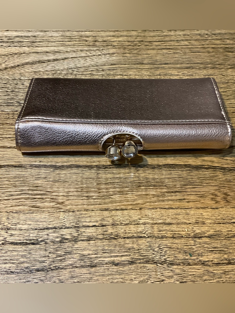 Metallic rose gold wallet with faux diamond clasp, EUC